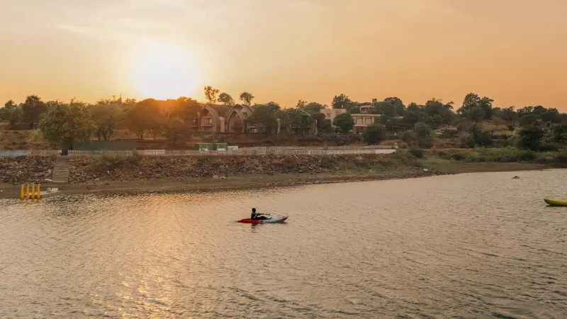 Ark Lake Resort on the banks of Vaitarna lake at sunset